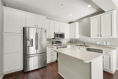 South-facing, move-in-ready townhome in the sought-after Lakes on TPC of the Twin Cities in Minnesota - for sale on GolfHomes.com, golf home, golf lot