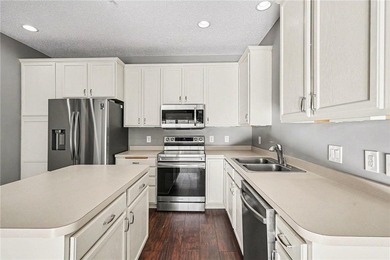 South-facing, move-in-ready townhome in the sought-after Lakes on TPC of the Twin Cities in Minnesota - for sale on GolfHomes.com, golf home, golf lot