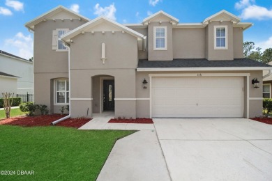 Tucked away in the coveted LPGA community, 116 Joyelle Circle is on LPGA International Golf Course in Florida - for sale on GolfHomes.com, golf home, golf lot