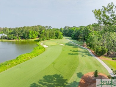 Nestled within the prestigious Ford Field and River Club, just a on The Ford Field and River Club  in Georgia - for sale on GolfHomes.com, golf home, golf lot