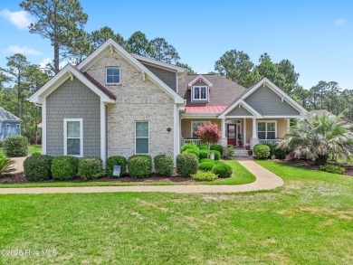 Discover this stunning 4-bedroom, 3-bath custom Craftsman home on Carolina National Golf Club in North Carolina - for sale on GolfHomes.com, golf home, golf lot
