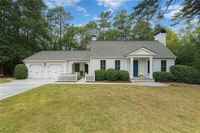 Beautifully situated on a peaceful +/-1.2-acre lot in one of on North Fulton Golf Course in Georgia - for sale on GolfHomes.com, golf home, golf lot