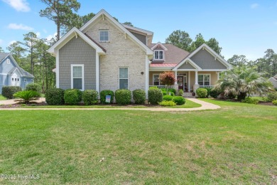 Discover this stunning 4-bedroom, 3-bath custom Craftsman home on Carolina National Golf Club in North Carolina - for sale on GolfHomes.com, golf home, golf lot