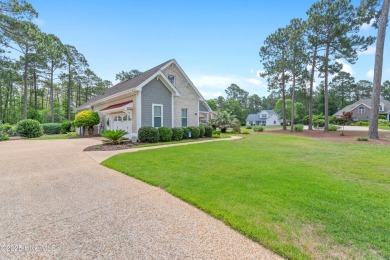 Discover this stunning 4-bedroom, 3-bath custom Craftsman home on Carolina National Golf Club in North Carolina - for sale on GolfHomes.com, golf home, golf lot