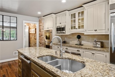 Beautifully situated on a peaceful +/-1.2-acre lot in one of on North Fulton Golf Course in Georgia - for sale on GolfHomes.com, golf home, golf lot