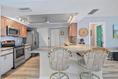 TURNKEY 2 BEDROOM, 2 BATH, 2 CAR GARAGE & POOL HOME IN on Oyster Creek Golf Club in Florida - for sale on GolfHomes.com, golf home, golf lot