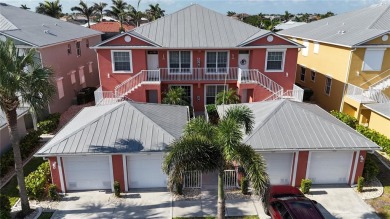 Enjoy breathtaking WATER AND CANAL VIEWS from the comfort of on Saint Andrews South Golf Club in Florida - for sale on GolfHomes.com, golf home, golf lot