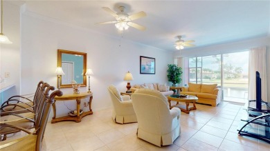Enjoy breathtaking WATER AND CANAL VIEWS from the comfort of on Saint Andrews South Golf Club in Florida - for sale on GolfHomes.com, golf home, golf lot