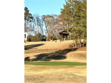Build your dream home on this .53 acre vacant wooded lot with on Meadow Lakes Golf Course in Georgia - for sale on GolfHomes.com, golf home, golf lot