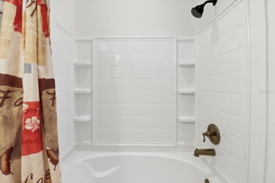 BETTER THAN NEW! 30k lot upgrade, large fenced yard. This 2024 on Trilogy at Ocala Preserve in Florida - for sale on GolfHomes.com, golf home, golf lot