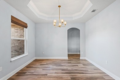 Welcome to refined living in this beautifully designed on Windswept Dunes Golf Club in Florida - for sale on GolfHomes.com, golf home, golf lot