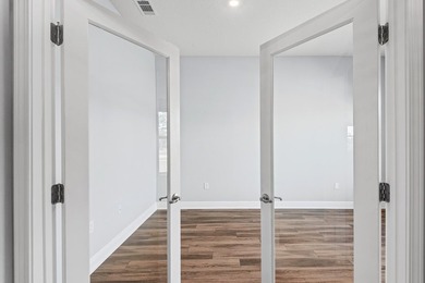 Welcome to refined living in this beautifully designed on Windswept Dunes Golf Club in Florida - for sale on GolfHomes.com, golf home, golf lot