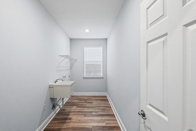 Welcome to refined living in this beautifully designed on Windswept Dunes Golf Club in Florida - for sale on GolfHomes.com, golf home, golf lot