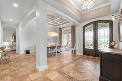 The 3 bedroom 3.5 bathroom home has a beautiful front elevation on Verandah Golf Course and Club in Florida - for sale on GolfHomes.com, golf home, golf lot