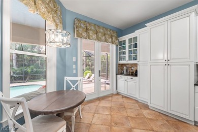 The 3 bedroom 3.5 bathroom home has a beautiful front elevation on Verandah Golf Course and Club in Florida - for sale on GolfHomes.com, golf home, golf lot