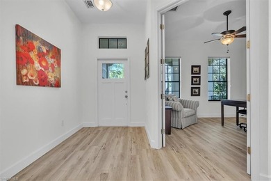 This beautiful *David Weekly* residence located at 16436 Windsor on River Hall Country Club in Florida - for sale on GolfHomes.com, golf home, golf lot