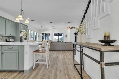 This beautiful *David Weekly* residence located at 16436 Windsor on River Hall Country Club in Florida - for sale on GolfHomes.com, golf home, golf lot