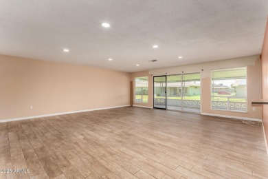Welcome to this beautifully maintained 2-bedroom, 2-bath Gemini on Sun City Lakes West and East in Arizona - for sale on GolfHomes.com, golf home, golf lot
