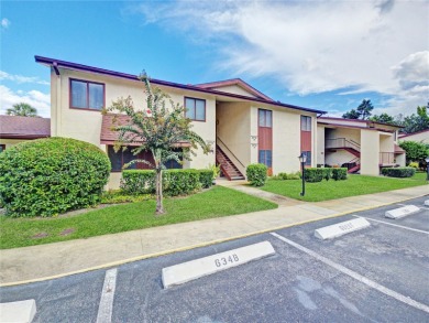 Beautifully Updated 1st-Floor Condo with Golf, Lake & Greenway on Country Club At Silver Springs Shores in Florida - for sale on GolfHomes.com, golf home, golf lot