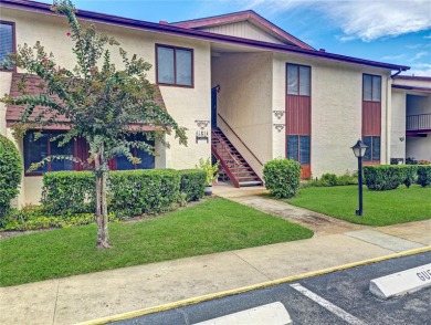 Beautifully Updated 1st-Floor Condo with Golf, Lake & Greenway on Country Club At Silver Springs Shores in Florida - for sale on GolfHomes.com, golf home, golf lot