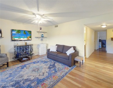 Beautifully Updated 1st-Floor Condo with Golf, Lake & Greenway on Country Club At Silver Springs Shores in Florida - for sale on GolfHomes.com, golf home, golf lot