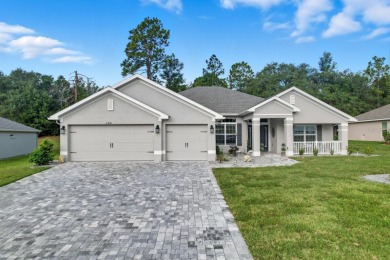 Welcome Home to your elegant 4-bedroom, 3-bath, 3-car garage on Juliette Falls Golf and Spa Club in Florida - for sale on GolfHomes.com, golf home, golf lot