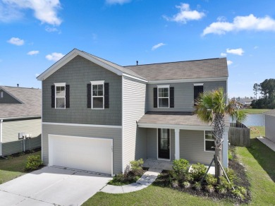 Welcome to this beautifully maintained 4-bedroom, 2.5-bath home on Cypress Point Par 3 in South Carolina - for sale on GolfHomes.com, golf home, golf lot