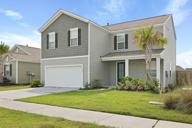Welcome to this beautifully maintained 4-bedroom, 2.5-bath home on Cypress Point Par 3 in South Carolina - for sale on GolfHomes.com, golf home, golf lot