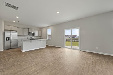 Welcome to this beautifully maintained 4-bedroom, 2.5-bath home on Cypress Point Par 3 in South Carolina - for sale on GolfHomes.com, golf home, golf lot