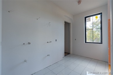 Amazing New Waterfront Home built by Thomas Construction in on The Oaks Golf Course in Missouri - for sale on GolfHomes.com, golf home, golf lot