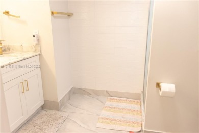*Spacious and Bright 1-Bedroom, 2-Bath Condo in Cypress Bend on Palm-Aire Country Club and Resort - Palms in Florida - for sale on GolfHomes.com, golf home, golf lot