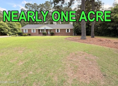 Spacious Brick Home on Nearly One Acre in Sought-After Trent on New Bern Golf and Country Club in North Carolina - for sale on GolfHomes.com, golf home, golf lot