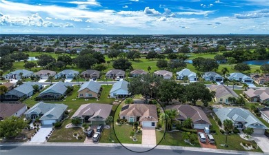 Beautifully updated home featuring a saltwater pool located in on Caloosa Greens Executive Golf Course in Florida - for sale on GolfHomes.com, golf home, golf lot