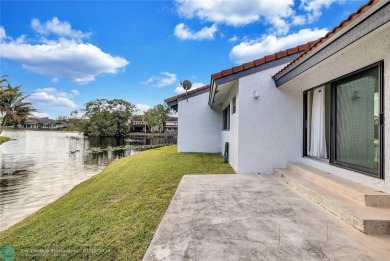 This Charming completely Renovated town home with IMPACT WINDOW on Jacaranda Golf Club in Florida - for sale on GolfHomes.com, golf home, golf lot