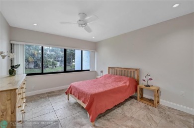 This Charming completely Renovated town home with IMPACT WINDOW on Jacaranda Golf Club in Florida - for sale on GolfHomes.com, golf home, golf lot