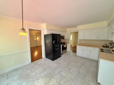 Spacious Brick Home on Nearly One Acre in Sought-After Trent on New Bern Golf and Country Club in North Carolina - for sale on GolfHomes.com, golf home, golf lot