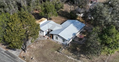 Welcome to this delightful Citrus Springs home! Featuring on Citrus Springs Country Club in Florida - for sale on GolfHomes.com, golf home, golf lot