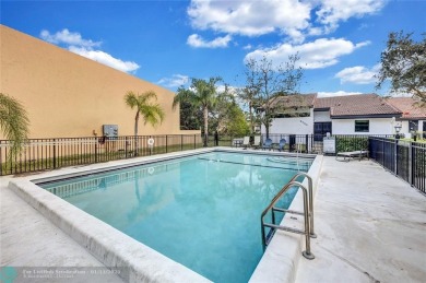 This Charming completely Renovated town home with IMPACT WINDOW on Jacaranda Golf Club in Florida - for sale on GolfHomes.com, golf home, golf lot