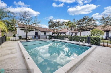 This Charming completely Renovated town home with IMPACT WINDOW on Jacaranda Golf Club in Florida - for sale on GolfHomes.com, golf home, golf lot