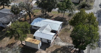 Welcome to this delightful Citrus Springs home! Featuring on Citrus Springs Country Club in Florida - for sale on GolfHomes.com, golf home, golf lot