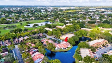 This Charming completely Renovated town home with IMPACT WINDOW on Jacaranda Golf Club in Florida - for sale on GolfHomes.com, golf home, golf lot