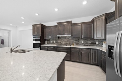 Stunning, newer-built Hawthorn model home in Calesa Township! on Stone Creek Golf Club in Florida - for sale on GolfHomes.com, golf home, golf lot