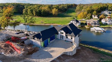 Amazing New Waterfront Home built by Thomas Construction in on The Oaks Golf Course in Missouri - for sale on GolfHomes.com, golf home, golf lot