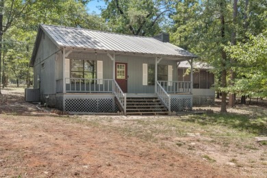 Adorable Cabin in the Woods on 3 Wooded Acres on Holly Lake Ranch Golf Club in Texas - for sale on GolfHomes.com, golf home, golf lot