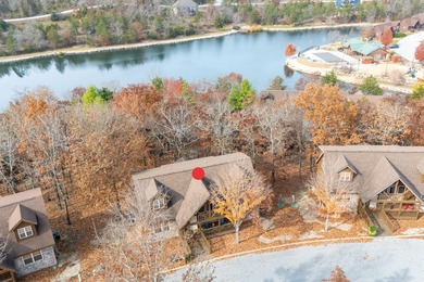 Welcome to the Whiskey Rock Lodge. This fully furnished 4 bed, 4 on Ledgestone Country Club and Golf Course in Missouri - for sale on GolfHomes.com, golf home, golf lot