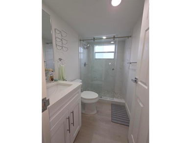 Welcome to this beautifully updated 2-bedroom & 2-bath first on Kings Point Golf -Flanders Way in Florida - for sale on GolfHomes.com, golf home, golf lot