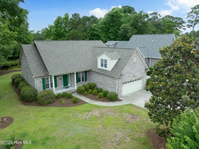 Nestled in a quiet cul-de-sac and backed by a serene pond shaded on Members Club At St. James Plantation in North Carolina - for sale on GolfHomes.com, golf home, golf lot