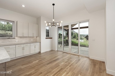 This Mountain Chic home is all about the views ! With windows on Headwaters Golf Course At Granby Ranch in Colorado - for sale on GolfHomes.com, golf home, golf lot