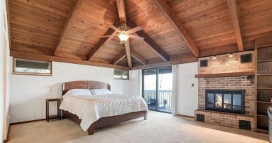 Soaring cedar ceilings, an abundance of natural light, and on The Dunedin Country Club in Florida - for sale on GolfHomes.com, golf home, golf lot