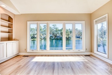 Panoramic lagoon views for waterfront Landings home only a half on The Landings Club - Oakridge in Georgia - for sale on GolfHomes.com, golf home, golf lot